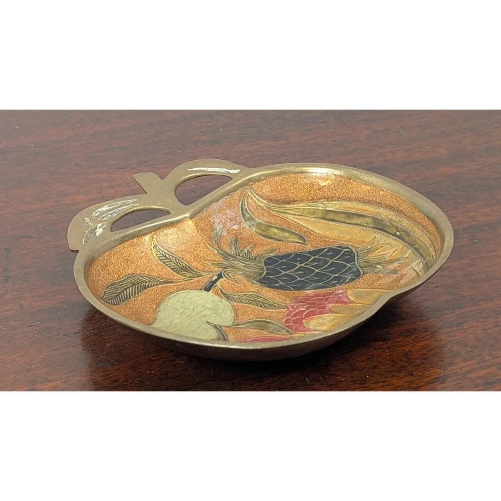 Vintage enameled brass apple-shaped trinket dish, often used for jewelry, keys